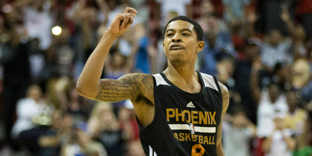 Phoenix Suns' Tyler Ulis (8) reacts after making a shot at the buzzer shot to defeat the Denver Nug...