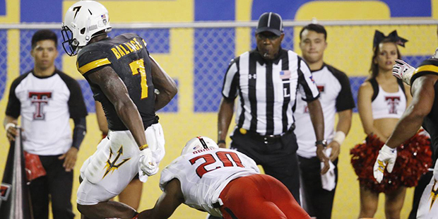 Arizona State's Kalen Ballage (7) runs for a touchdown against Texas Tech's Jordyn Brooks (20) duri...
