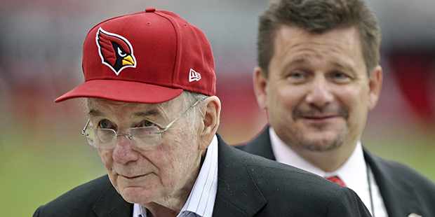 Arizona Cardinals owner Bill Bidwill, front, and his son, team president Michael Bidwill, stand on ...