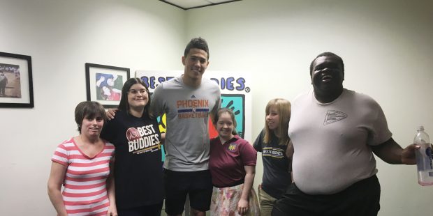 Suns gaurd Devin Booker poses with some of the participants in the Big Buddies Arizona program. (Ph...