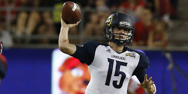 Northern Arizona quarterback Case Cookus (15) during the second half of an NCAA college football ga...