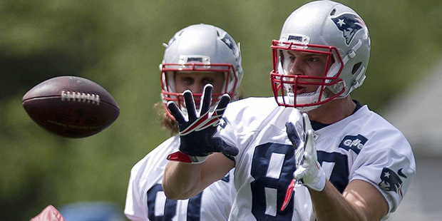 New England Patriots tight end Rob Gronkowski (87) catches a pass during an NFL football practice M...