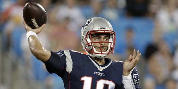 New England Patriots' Jimmy Garoppolo (10) looks to pass against the Carolina Panthers during the s...