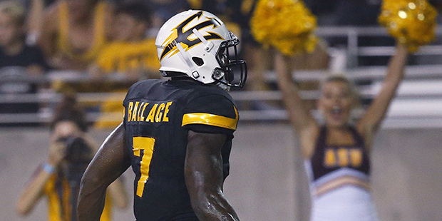 Arizona State's Kalen Ballage scores one of his eight touchdowns against Texas Tech, during the sec...