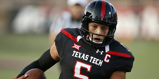 Texas Tech's Pat Mahomes runs the ball into the end zone to score his first touchdown against Steph...