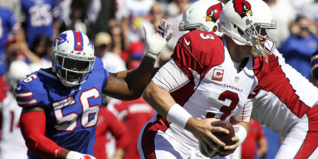 Arizona Cardinals quarterback Carson Palmer (3) is pressured by Buffalo Bills linebacker Lerentee M...