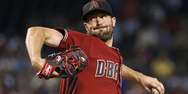 Arizona Diamondbacks' Robbie Ray throws a pitch against the Los Angeles Dodgers during the first in...