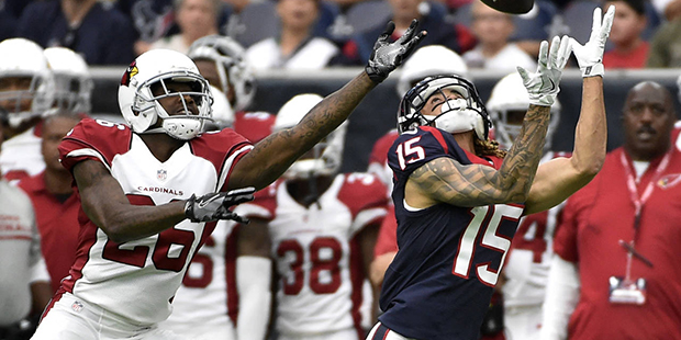 Houston Texans wide receiver Will Fuller (15) reaches for a pass in front of Arizona Cardinals corn...