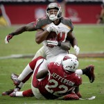 Tampa Bay Buccaneers cornerback Brent Grimes (24) is hit by Arizona Cardinals strong safety Tony Jefferson (22) during the second half of an NFL football game, Sunday, Sept. 18, 2016, in Glendale, Ariz. (AP Photo/Rick Scuteri)