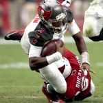 Tampa Bay Buccaneers quarterback Jameis Winston (3) his hit by Arizona Cardinals outside linebacker Deone Bucannon (20) during the second half of an NFL football game, Sunday, Sept. 18, 2016, in Glendale, Ariz. (AP Photo/Ross D. Franklin)