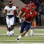 Arizona wide receiver Trey Griffey (5) runs after the catch against Grambling State during the first half of an NCAA college football game, Saturday, Sept. 10, 2016, in Tucson, Ariz. (AP Photo/Rick Scuteri)
