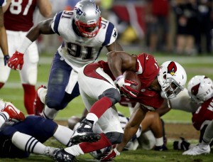 Arizona Cardinals running back David Johnson (31) runs for a first down against the New England Patriots during the second half of an NFL football game, Sunday, Sept. 11, 2016, in Glendale, Ariz. (AP Photo/Ross D. Franklin)