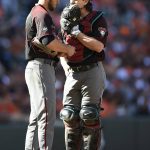 Arizona Diamondbacks pitcher Braden Shipley, left, talks with catcher Tuffy Gosewisch in the sixth inning of a baseball game against the Baltimore Orioles, Sunday, Sept.25, 2016, in Baltimore. (AP Photo/Gail Burton)
