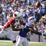 Arizona Cardinals defensive back Marcus Cooper (41) breaks up a pass intended for Buffalo Bills wide receiver Marquise Goodwin (88) during the first half of an NFL football game on Sunday, Sept. 25, 2016, in Orchard Park, N.Y. (AP Photo/Bill Wippert)