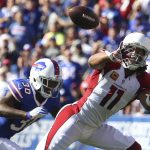 Arizona Cardinals wide receiver Larry Fitzgerald (11) makes a catch in front of Buffalo Bills defensive back Corey White (30) during the second half of an NFL football game on Sunday, Sept. 25, 2016, in Orchard Park, N.Y. (AP Photo/Bill Wippert)