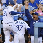 Los Angeles Dodgers' Joc Pederson, left, is congratulated by manager Dave Roberts after hitting a solo home run during the fifth inning of a baseball game against the Arizona Diamondbacks, Monday, Sept. 5, 2016, in Los Angeles. (AP Photo/Mark J. Terrill)