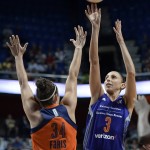 Phoenix Mercury's Diana Taurasi shoots as Connecticut Sun's Kelly Faris, left, defends during the second half of a WNBA basketball game, Friday, Sept. 2, 2016, in Uncasville, Conn. (AP Photo/Jessica Hill)
