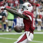 Arizona Cardinals wide receiver Jaron Brown (13) celebrates his touchdown against the Tampa Bay Buccaneers during the first half of an NFL football game, Sunday, Sept. 18, 2016, in Glendale, Ariz. (AP Photo/Rick Scuteri)