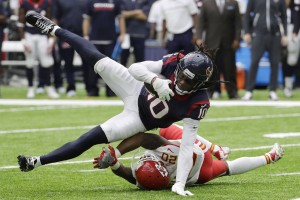 Houston Texans wide receiver DeAndre Hopkins (10) is upended by Kansas City Chiefs cornerback Steven Nelson (20) during the second half of an NFL football game Sunday, Sept. 18, 2016, in Houston. (AP Photo/David J. Phillip)