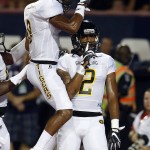 Grambling State wide receiver Verlan Hunter (2) celebrates with Dominique Leake after scoring during the first half of an NCAA college football game against Arizona, Saturday, Sept. 10, 2016, in Tucson, Ariz. (AP Photo/Rick Scuteri)