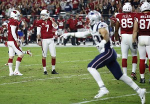 Arizona Cardinals kicker Chandler Catanzaro (7) looks at punter Drew Butler (2) after missing a game winning field goal attempt during the second half of an NFL football game against the New England Patriots, Sunday, Sept. 11, 2016, in Glendale, Ariz. The Patriots won 23-21. (AP Photo/Ross D. Franklin)