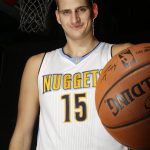 Denver Nuggets' Nikola Jokic from Serbia poses for a photo during media day, Monday, Sept. 27, 2016, in Denver. (AP Photo/Jack Dempsey)