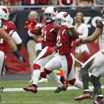 Arizona Cardinals cornerback Patrick Peterson (21) runs back an interception against the Tampa Bay Buccaneers during the first half of an NFL football game, Sunday, Sept. 18, 2016, in Glendale, Ariz. (AP Photo/Ross D. Franklin)