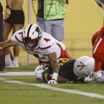 Texas Tech's Justin Stockton (4) is stopped just short of the end zone as he is tackled by Arizona State's Armand Perry, right, during the first half of an NCAA college football game Saturday, Sept. 10, 2016, in Tempe, Ariz. (AP Photo/Ross D. Franklin)