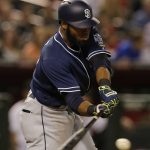 San Diego Padres' Manuel Margot hits an RBI-double in the fourth inning during a baseball game against the Arizona Diamondbacks, Friday, Sept. 30, 2016, in Phoenix. (AP Photo/Rick Scuteri)