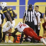 Arizona State's Kalen Ballage (7) runs for a touchdown against Texas Tech's Jordyn Brooks (20) during the first half of an NCAA college football game Saturday, Sept. 10, 2016, in Tempe, Ariz. (AP Photo/Ross D. Franklin)