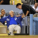 Actor Charlie Sheen, right, talks with former Los Angeles Dodgers manager Tommy Lasorda as they during a baseball game between the Dodgers and the Arizona Diamondbacks, Tuesday, Sept. 6, 2016, in Los Angeles. (AP Photo/Mark J. Terrill)