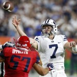 BYU quarterback Taysom Hill (7) throws during the first half against Arizona in an NCAA college football game, Saturday, Sept. 3, 2016, in Phoenix. (AP Photo/Rick Scuteri)