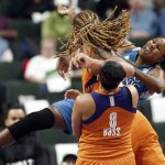 Minnesota Lynx's Sylvia Fowles, right, gets upended after Phoenix Mercury's Brittney Griner blocked her shot in the second half of a WNBA playoff semi-finals basketball game Wednesday, Sept. 28, 2016, in St. Paul, Minn. (AP Photo/Jim Mone)