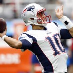 New England Patriots quarterback Jimmy Garoppolo (10) warms up prior to an NFL football game against the Arizona Cardinals, Sunday, Sept. 11, 2016, in Glendale, Ariz. (AP Photo/Ross D. Franklin)