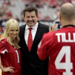 Arizona Cardinals president Michael Bidwill has his picture taken with actress and singer Kristin Chenoweth prior to an NFL football game against the New England Patriots, Sunday, Sept. 11, 2016, in Glendale, Ariz. (AP Photo/Rick Scuteri)