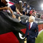 New England Patriots owner Robert Kraft greets Patriots fans prior to an NFL football game against the Arizona Cardinals, Sunday, Sept. 11, 2016, in Glendale, Ariz. (AP Photo/Ross D. Franklin)