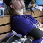 Colorado Rockies starting pitcher Jon Gray sits in the dugout after giving up four runs before retiring the Arizona Diamondbacks in the seventh inning of a baseball game Sunday, Sept. 4, 2016, in Denver. (AP Photo/David Zalubowski)