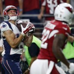New England Patriots wide receiver Chris Hogan (15) pulls in a touchdown pass against the Arizona Cardinals during an NFL football game, Sunday, Sept. 11, 2016, in Glendale, Ariz. (AP Photo/Ross D. Franklin)