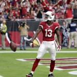 Arizona Cardinals wide receiver Jaron Brown (13) celebrates his touchdown against the Tampa Bay Buccaneers during the first half of an NFL football game, Sunday, Sept. 18, 2016, in Glendale, Ariz. (AP Photo/Rick Scuteri)