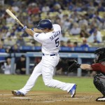 Los Angeles Dodgers' Corey Seager hits an RBI double during the first inning of a baseball game against the Arizona Diamondbacks, Wednesday, Sept. 7, 2016, in Los Angeles. (AP Photo/Jae C. Hong)