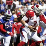 Arizona Cardinals quarterback Carson Palmer (3) is pressured by Buffalo Bills linebacker Lerentee McCray (56) during the first half of an NFL football game on Sunday, Sept. 25, 2016, in Orchard Park, N.Y. (AP Photo/Jeffrey T. Barnes)
