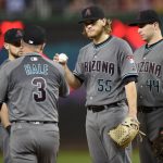 Arizona Diamondbacks starting pitcher Matt Koch (55) is pulled from the game by manager Chip Hale (3) during the sixth inning of a baseball game against the Washington Nationals, Tuesday, Sept. 27, 2016, in Washington. Also seen is Arizona Diamondbacks first baseman Paul Goldschmidt (44). (AP Photo/Nick Wass)