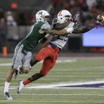 Arizona safety Jarvis McCall Jr. (29) breaks up a pass intended for Hawaii wide receiver Kalakaua Timoteo in the first half during an NCAA college football game against Hawaii, Saturday, Sept. 17, 2016, in Tucson, Ariz. (AP Photo/Rick Scuteri)