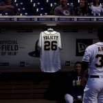 A jersey hangs in the dugout in honor of Yuliett Solarte, the wife of San Diego Padres third baseman Yangervis Solarte, before the team plays the Arizona Diamondbacks in a baseball game Monday, Sept. 19, 2016, in San Diego. Yuliette died of complications related to cancer on Saturday. (AP Photo/Gregory Bull)