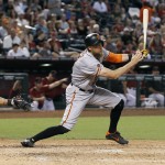 San Francisco Giants' Hunter Pence hits a double against the Arizona Diamondbacks during the seventh inning of a baseball game, Sunday, Sept. 11, 2016, in Phoenix. (AP Photo/Ralph Freso)