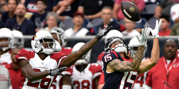 Houston Texans wide receiver Will Fuller (15) reaches for a pass in front of Arizona Cardinals corn...