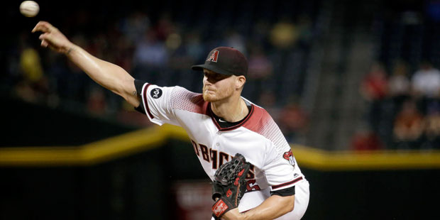 Arizona Diamondbacks pitcher Shelby Miller (26) throws during the first inning of a baseball game a...