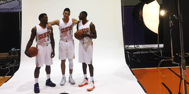 Eric Bledsoe, Devin Booker and Brandon Knight pose at Phoenix Suns media day on Sept. 26, 2016. (Ke...