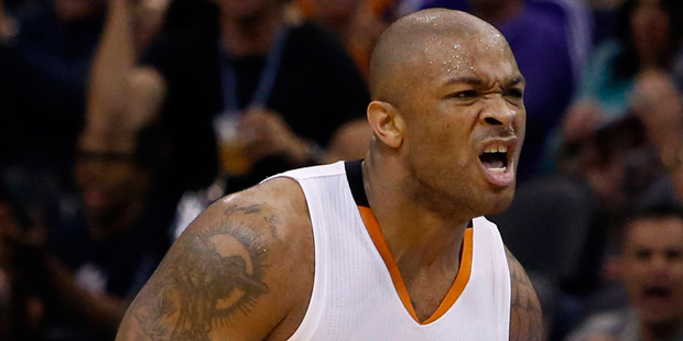 Phoenix Suns forward P.J. Tucker reacts after getting fouled against the Memphis Grizzlies during t...