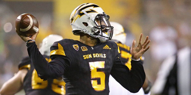 Arizona State's Manny Wilkins throws a pass against Texas Tech during the first half of an NCAA col...